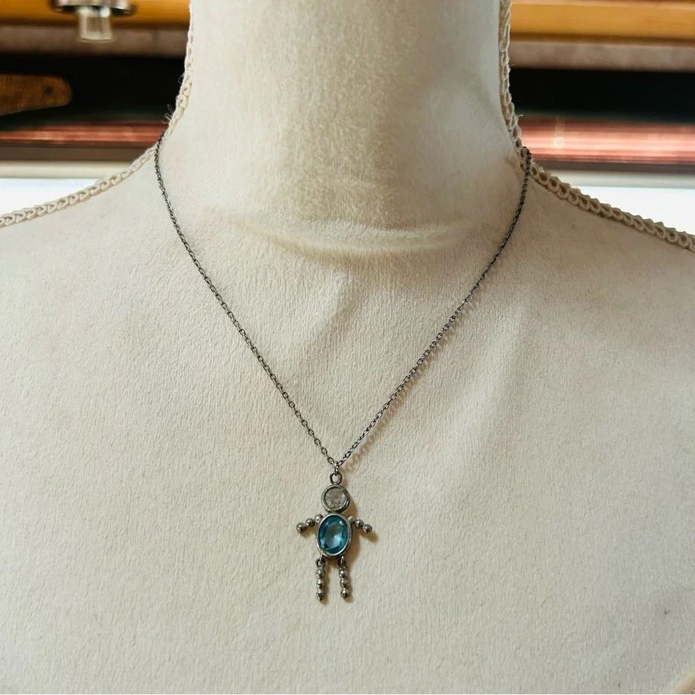 Vintage articulated leg crystal man pendant on chain necklace